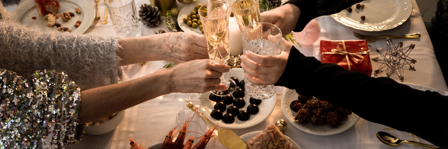 Friends raising champagne glasses in a toast, capturing a moment of joy and camaraderie.
